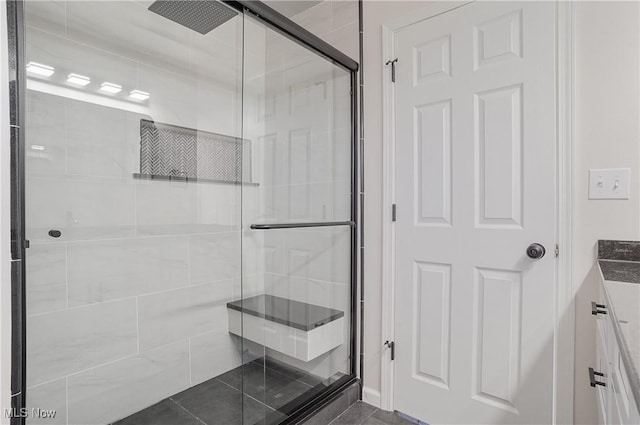 bathroom featuring a stall shower