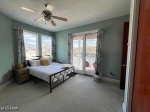 bedroom featuring access to outside, baseboards, and ceiling fan