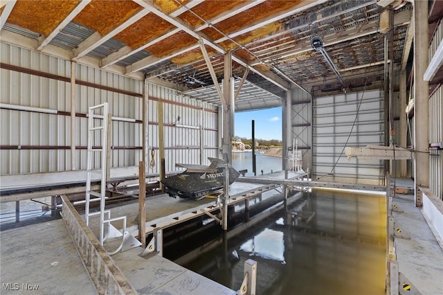 dock area with a water view