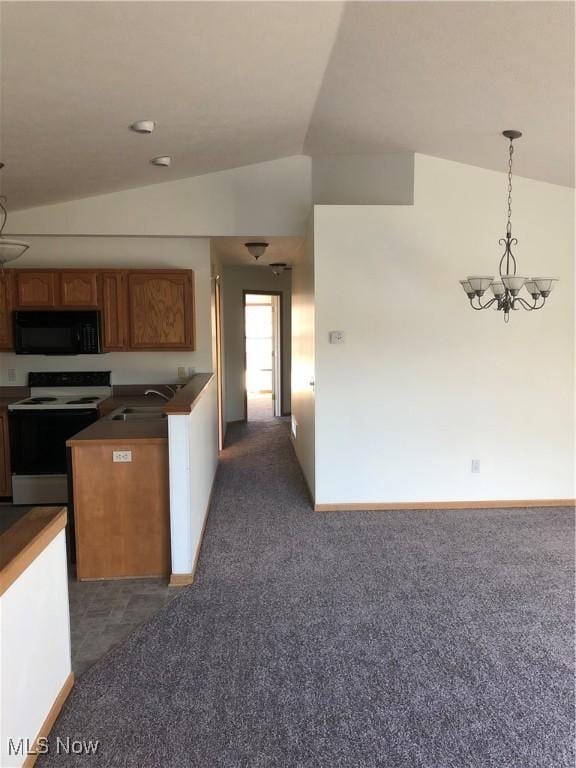 kitchen featuring electric stove, a sink, carpet flooring, black microwave, and vaulted ceiling