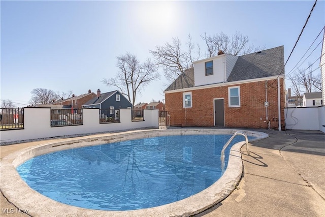 view of pool featuring a fenced in pool and fence