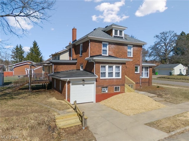 exterior space featuring brick siding and concrete driveway