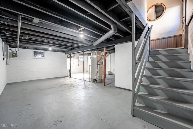 unfinished basement with heating unit