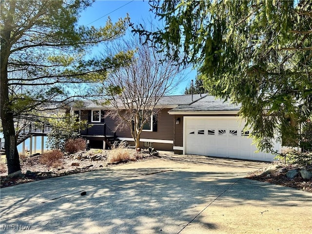 view of front of home with an attached garage and driveway