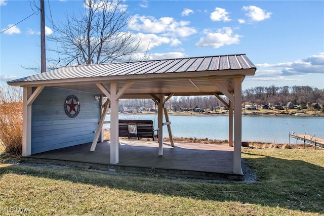 view of patio / terrace with a gazebo and a water view