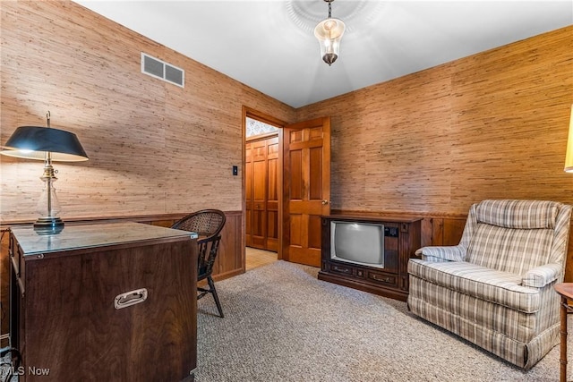 carpeted home office with visible vents