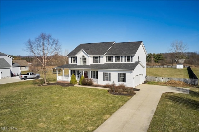 view of front of property with a front lawn, a porch, concrete driveway, and a garage