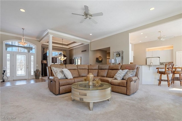 living room featuring crown molding, recessed lighting, light colored carpet, and ceiling fan