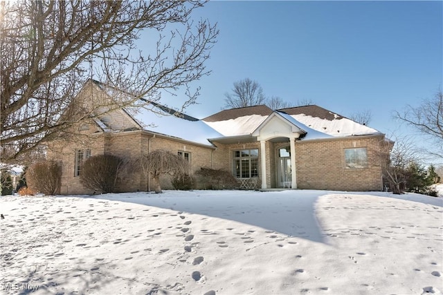 ranch-style home with brick siding