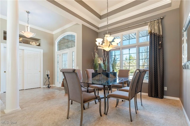 dining room featuring a notable chandelier, light colored carpet, crown molding, and a towering ceiling