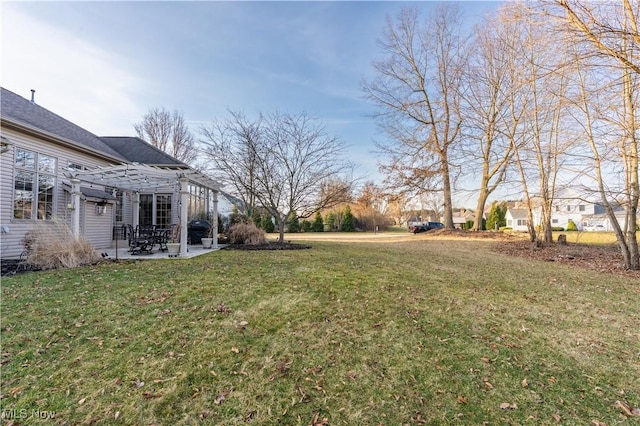 view of yard with a patio and a pergola