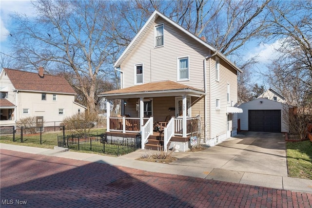 view of front of house featuring a fenced front yard, covered porch, an outdoor structure, concrete driveway, and a garage