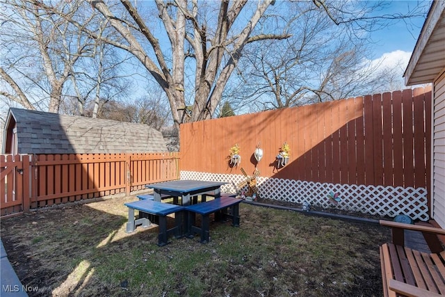 view of yard with a fenced backyard