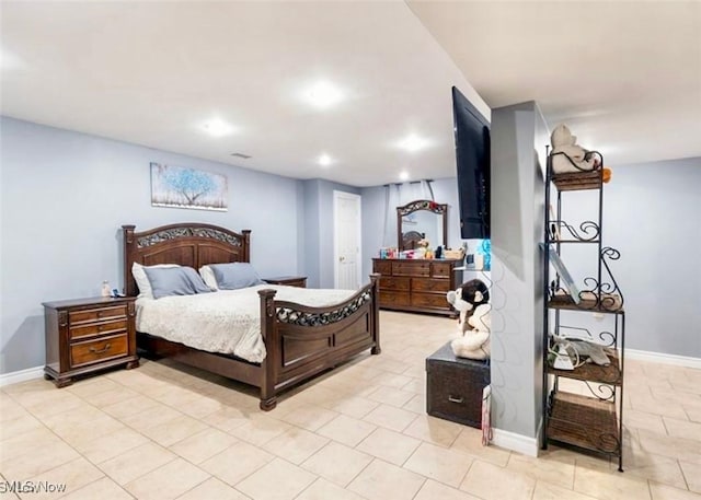 bedroom with light tile patterned floors, recessed lighting, and baseboards