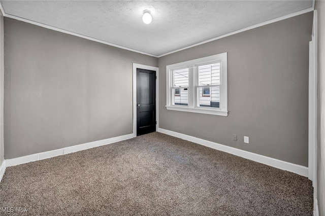 12117 Craven Ave, Cleveland, OH 44105 - carpeted spare room with ornamental molding, a textured ceiling, and baseboards