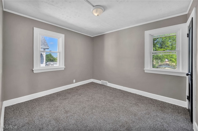 12117 Craven Ave, Cleveland, OH 44105 - spare room featuring dark colored carpet, baseboards, and crown molding