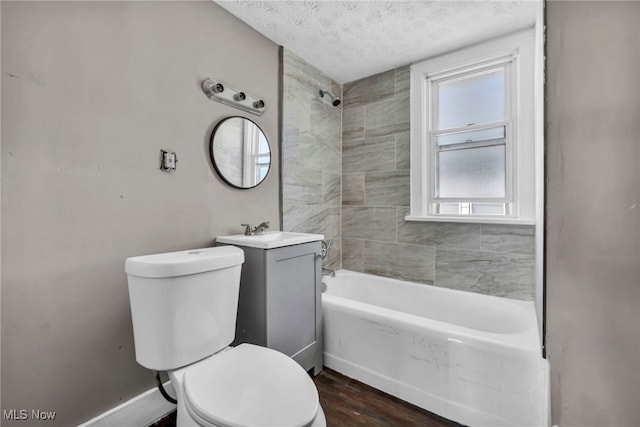 12117 Craven Ave, Cleveland, OH 44105 - full bathroom featuring toilet, wood finished floors, a textured ceiling, shower / tub combination, and baseboards