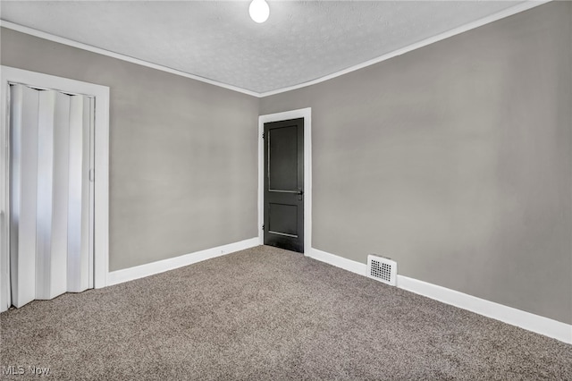 12117 Craven Ave, Cleveland, OH 44105 - carpeted spare room featuring crown molding, a textured ceiling, and baseboards