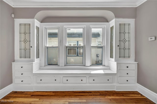 12117 Craven Ave, Cleveland, OH 44105 - mudroom featuring crown molding, wood finished floors, and baseboards