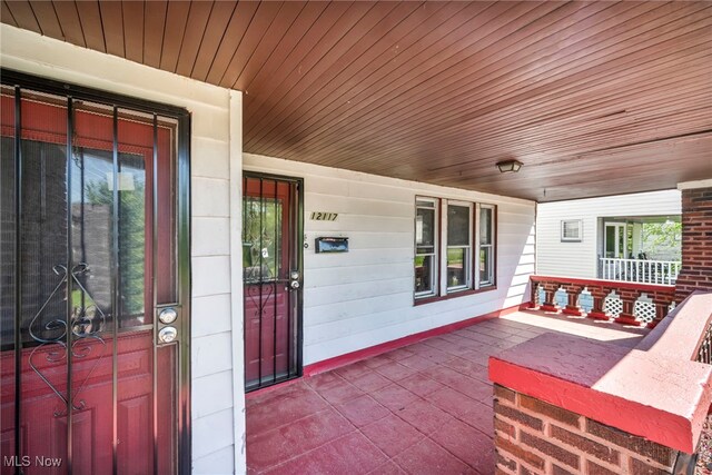 12117 Craven Ave, Cleveland, OH 44105 - doorway to property with a porch