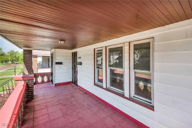 12117 Craven Ave, Cleveland, OH 44105 - view of patio featuring a porch