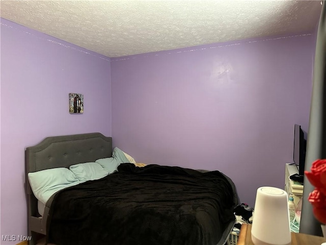 bedroom with a textured ceiling