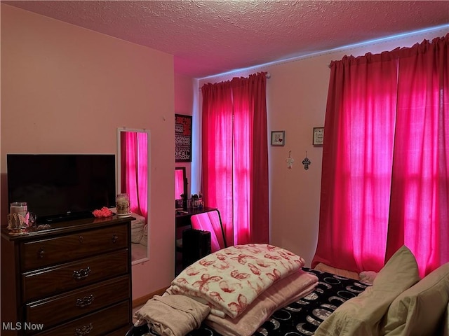 bedroom with a textured ceiling