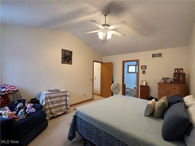 bedroom featuring a ceiling fan, baseboards, visible vents, lofted ceiling, and light carpet