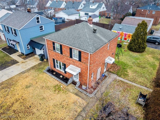 drone / aerial view with a residential view