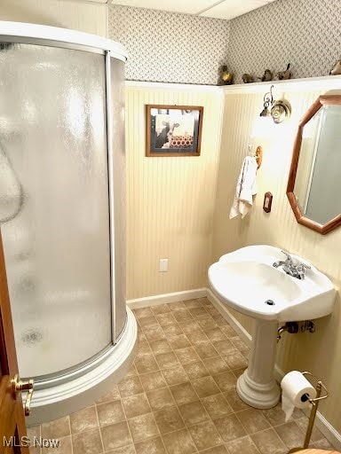 bathroom with a shower stall