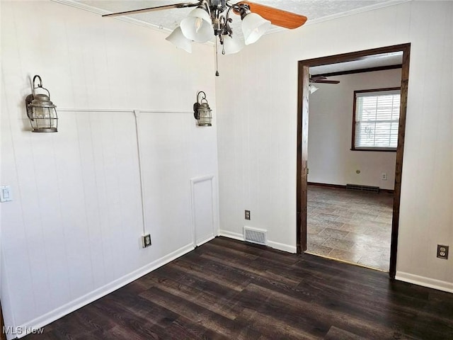 empty room with a ceiling fan, visible vents, dark wood-style flooring, and ornamental molding