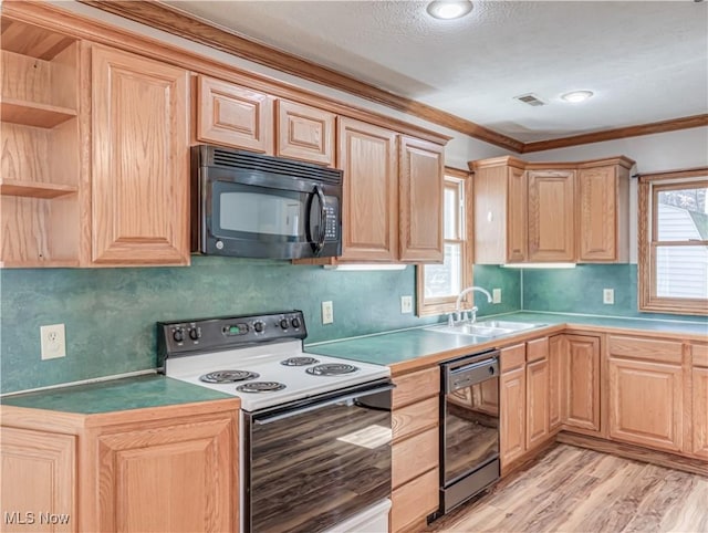 kitchen featuring light wood-type flooring, black appliances, light brown cabinetry, a sink, and open shelves