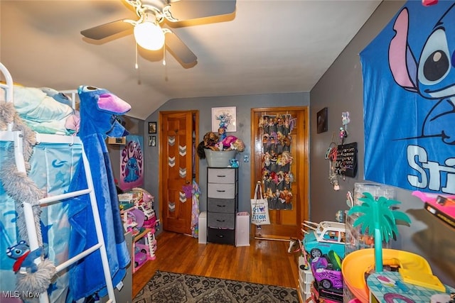 interior space with ceiling fan and wood finished floors