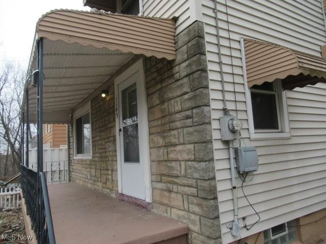 view of home's exterior featuring stone siding