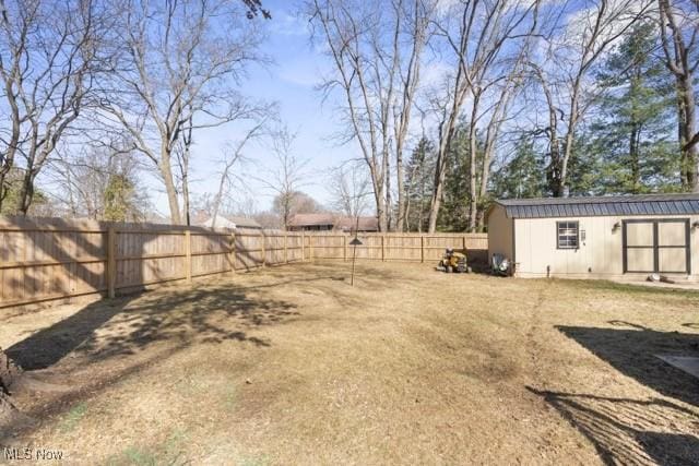 view of yard with a fenced backyard