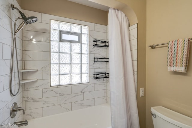 full bathroom with toilet, plenty of natural light, and shower / bathtub combination with curtain