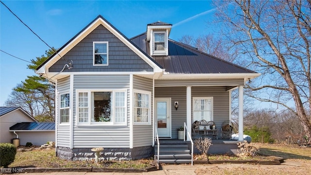 view of front of home with metal roof and covered porch