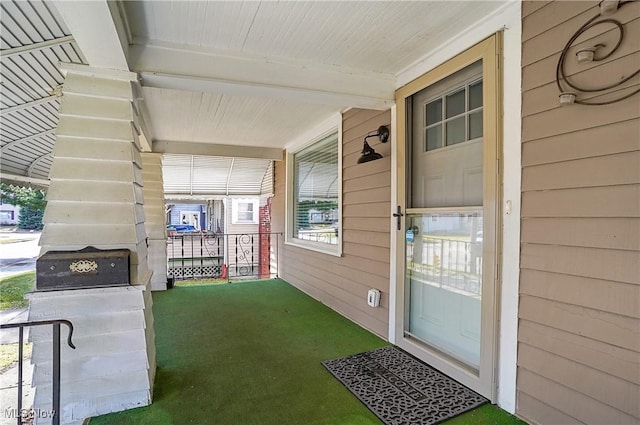 entrance to property with a porch