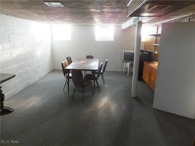 dining area with visible vents and concrete flooring