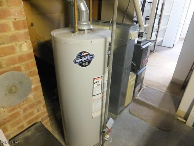 utility room featuring water heater