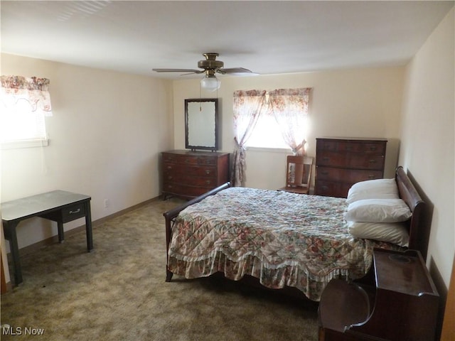 bedroom featuring carpet flooring, baseboards, and ceiling fan