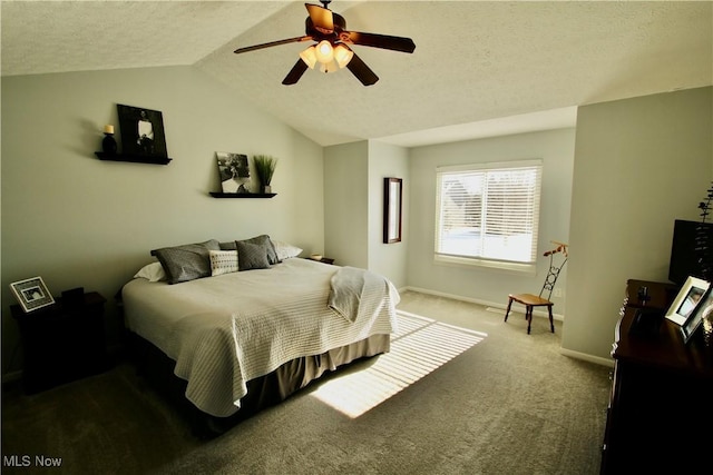 carpeted bedroom featuring baseboards, ceiling fan, a textured ceiling, and lofted ceiling