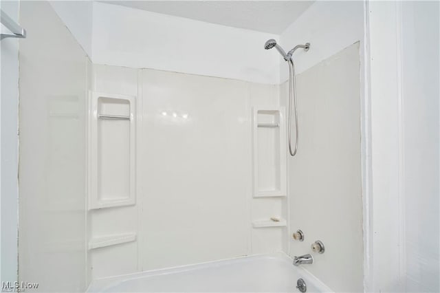 bathroom with shower / bathing tub combination