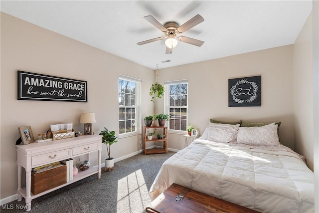 bedroom featuring carpet flooring, visible vents, a ceiling fan, and baseboards