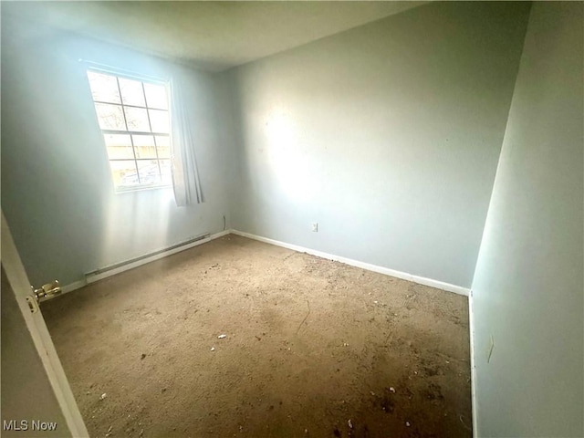 spare room with baseboard heating