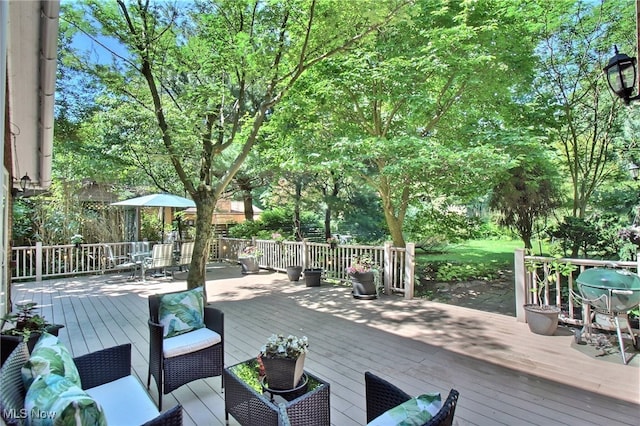 wooden terrace with grilling area