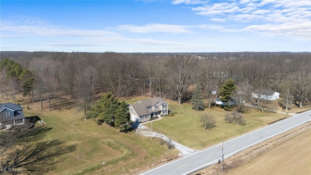 bird's eye view featuring a view of trees