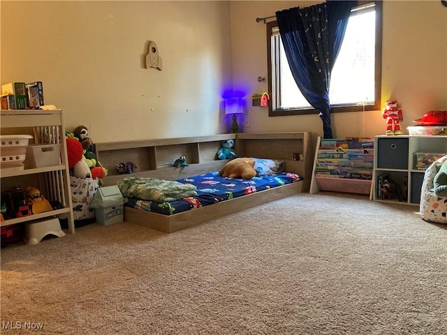 bedroom featuring carpet floors