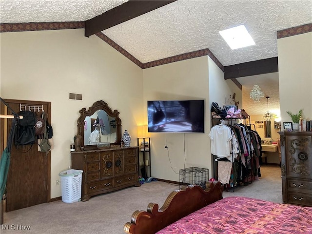 bedroom featuring visible vents, baseboards, lofted ceiling with beams, carpet flooring, and a textured ceiling