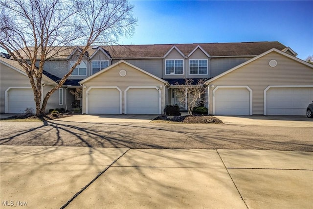 view of front of property with a garage and driveway